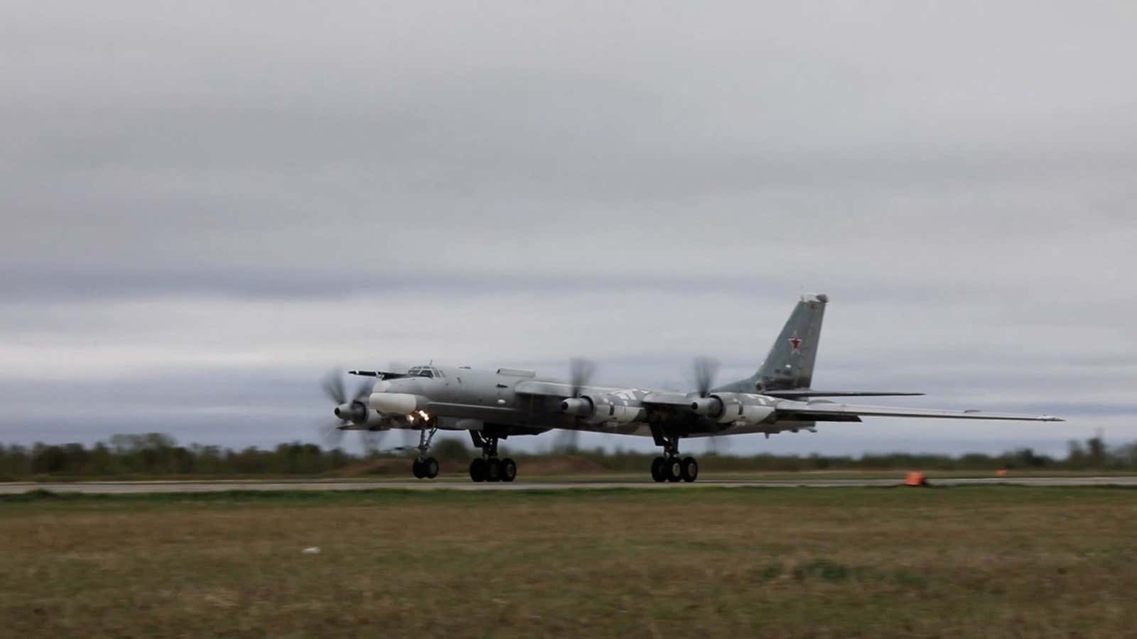 Russian Tu-95 strategic bomber takes off during Russian-Chinese military aerial exercises to patrol the Asia-Pacific region.