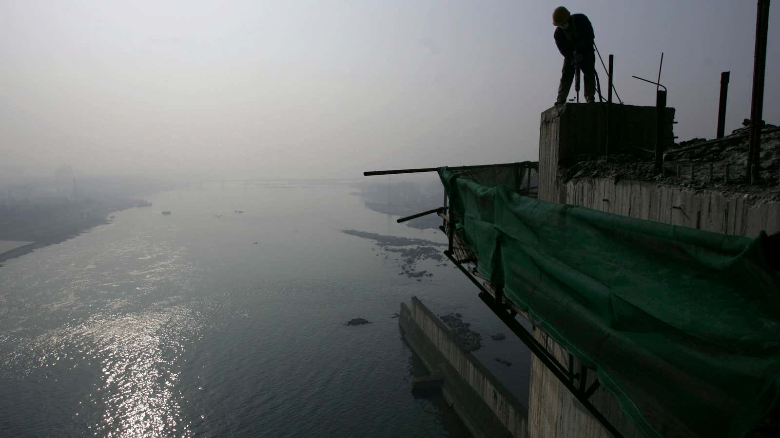 A worker along the Danjiangkou Reservoir.