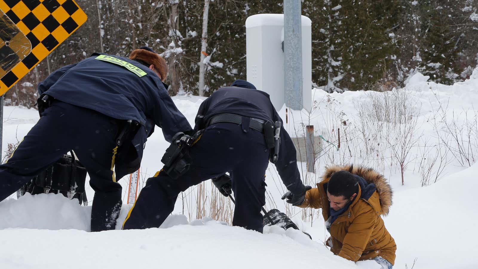 An arduous journey made difficult by winter. (Reuters/Christinne Muschi )