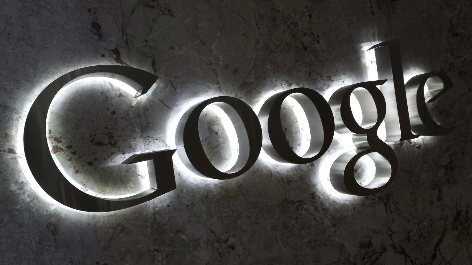 A Google logo is seen at the entrance to the company’s offices in Toronto September 5, 2013. REUTERS/Chris Helgren (CANADA – Tags: MEDIA BUSINESS LOGO)