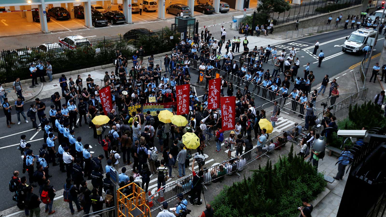 Police officers surround protesters on May 17, 2016.