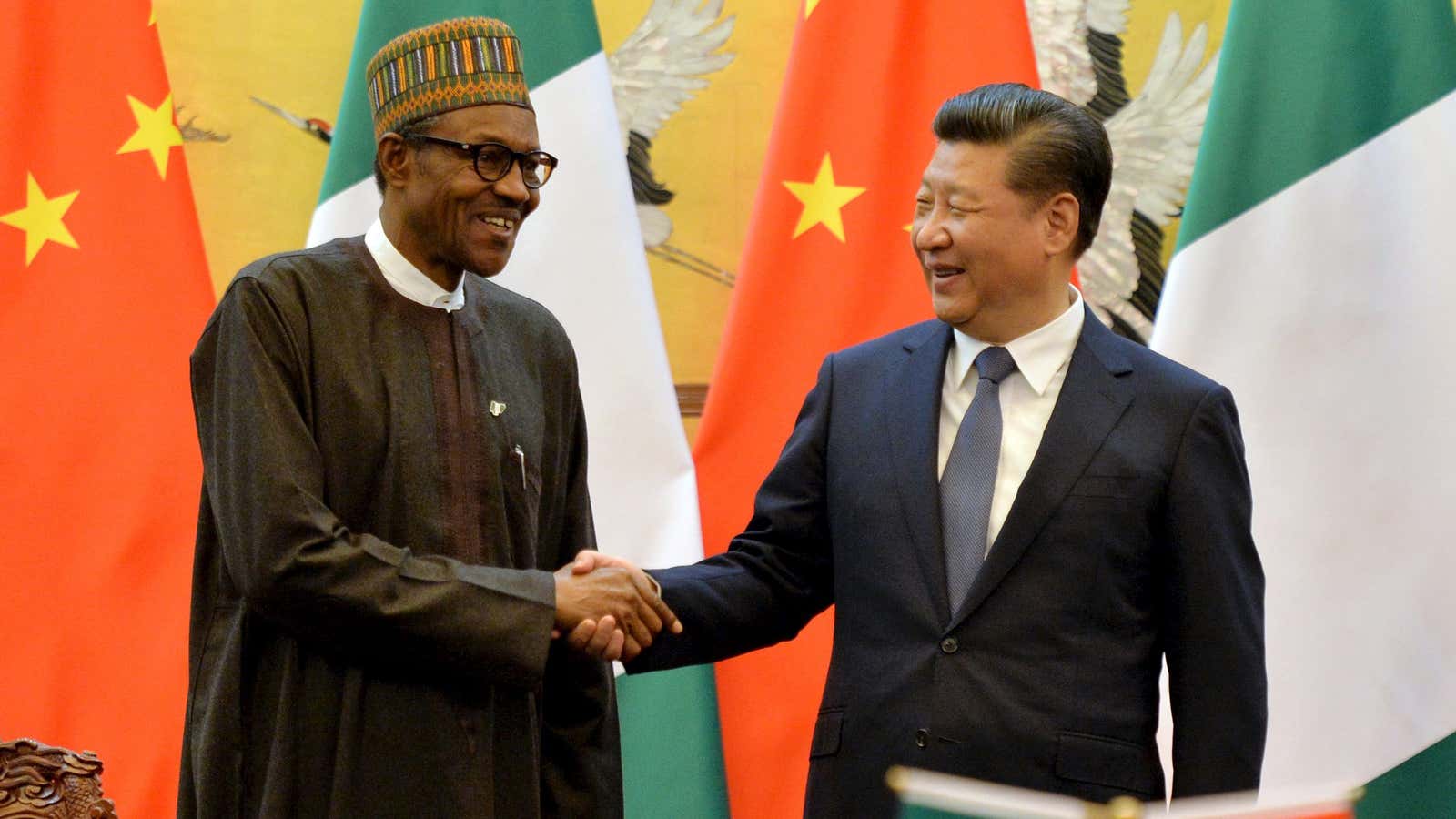 Nigerian president, Muhammadu Buhari (L) and Chinese president, Xi Jinping in Beijing, April 12, 2016.