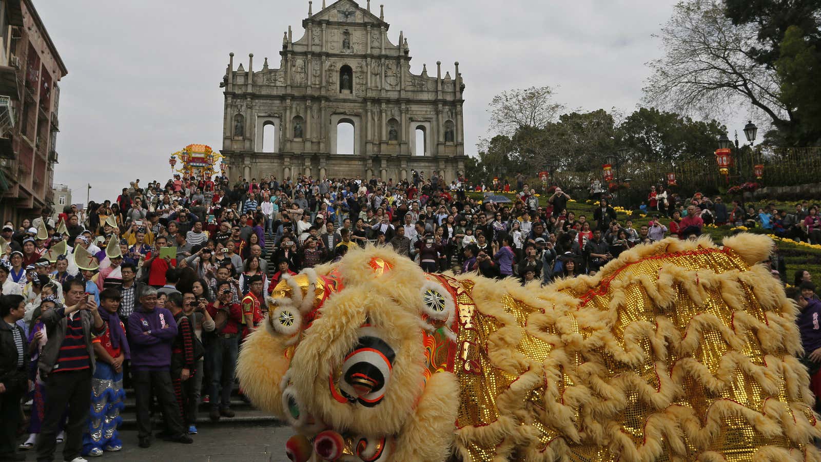 Macau’s ruin of St. Paul’s, with lion dance.