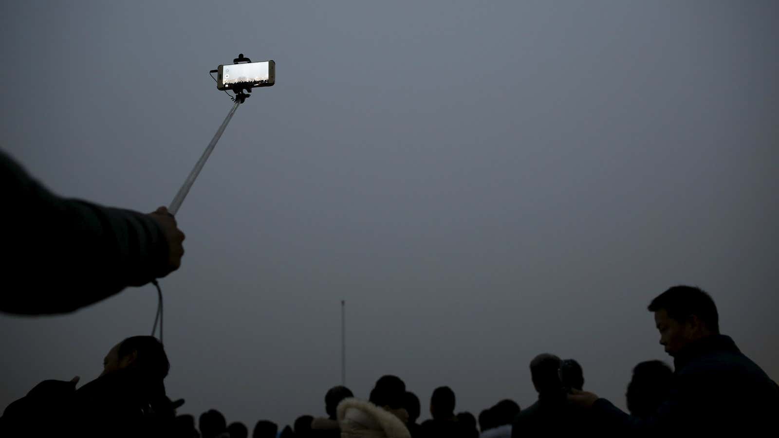 At a flag raising ceremony, Tiananmen Square, Dec. 9.