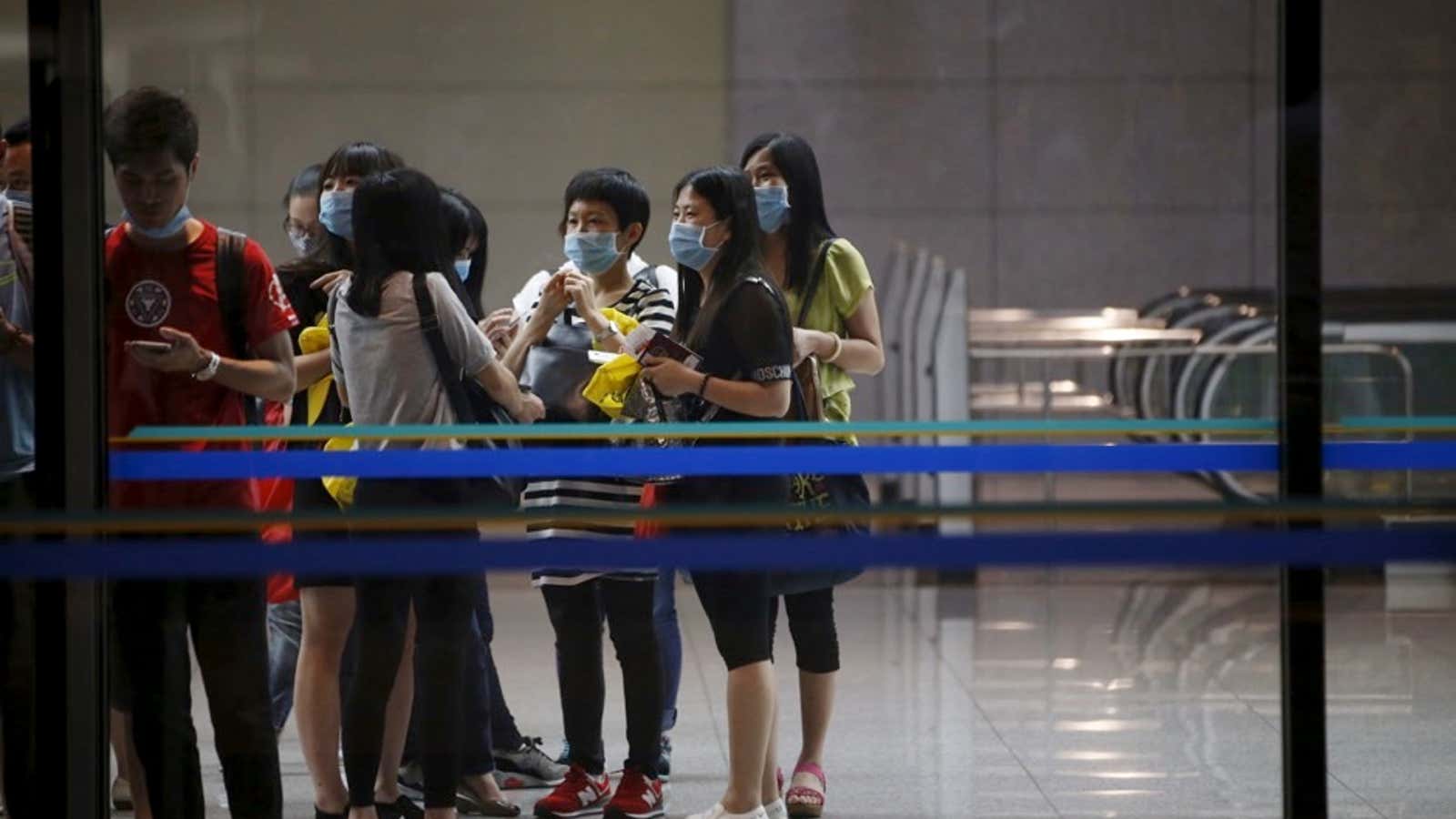 Passengers waiting for the train at Incheon International Airport in South Korea.