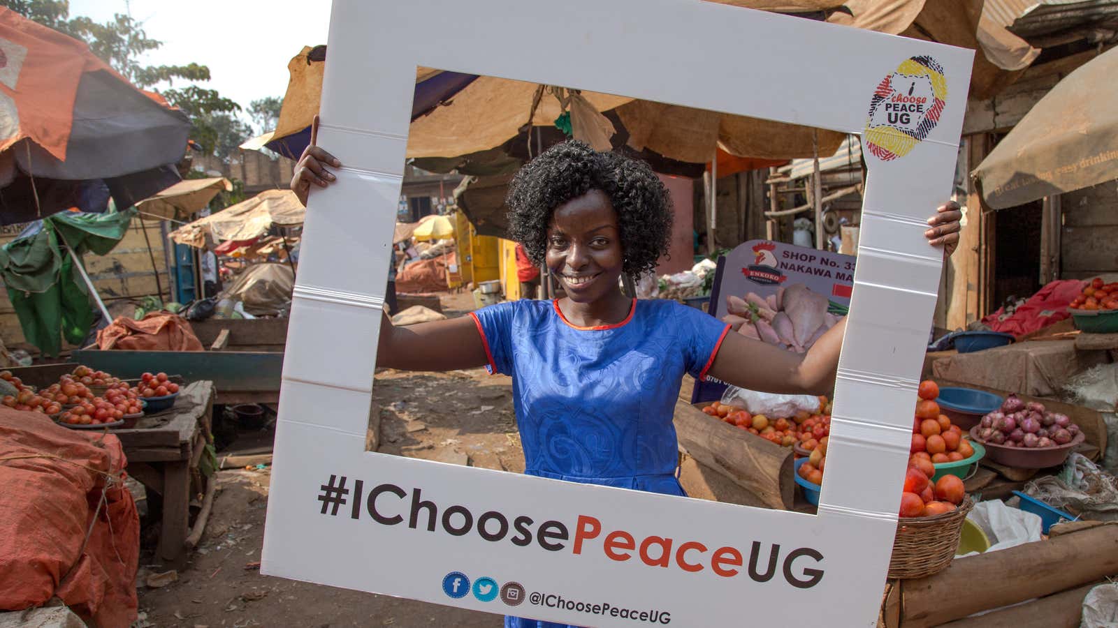 Desire Karakire, founder of #IChoosePeaceUG movement, visits Nakawa Market in Kampala to encourage citizens to contribute to a peaceful election.