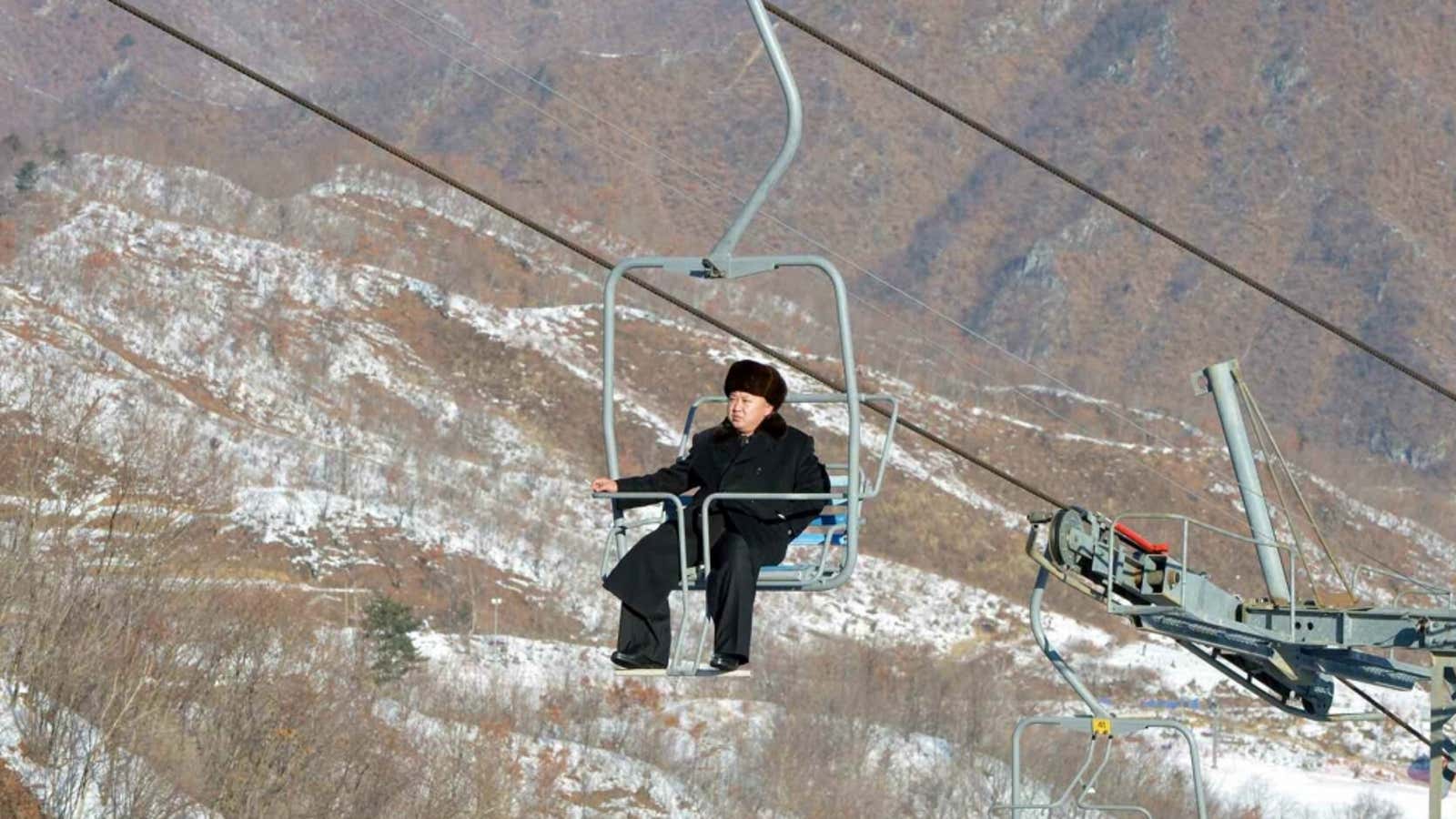 Kim Jong-un rides a chairlift.