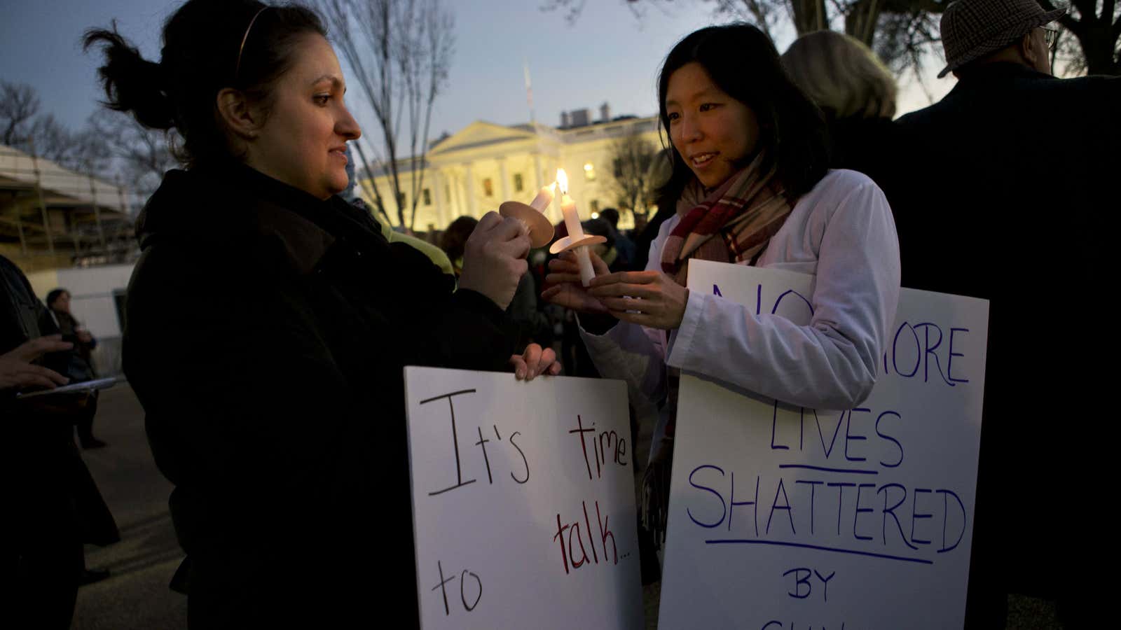 The need to do: A vigil held at the White House after the Connecticut school shootings.