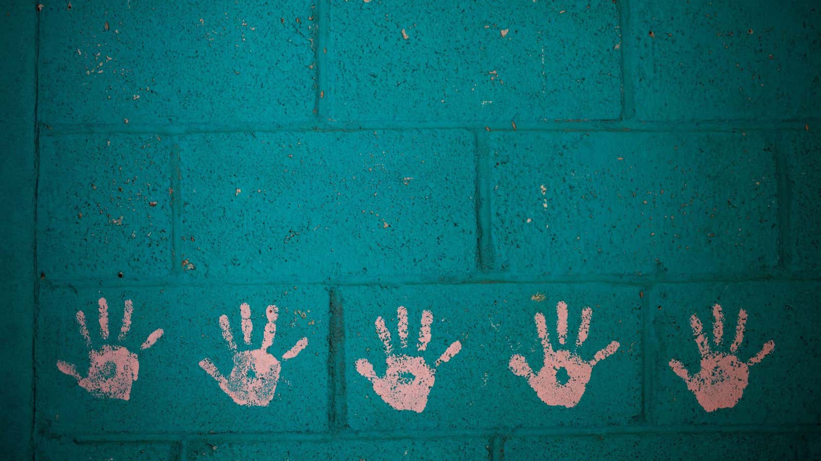 This Sept. 20, 2016 photo shows a child’s room decorated with handprints inside an abandoned home in the neighborhood El Cambray in Santa Catarina Pinula…