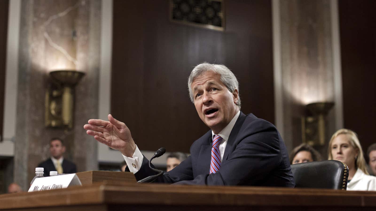 JP Morgan CEO Jamie Dimon will be missed at tomorrow’s US Senate hearings on the bank’s London Whale losses.