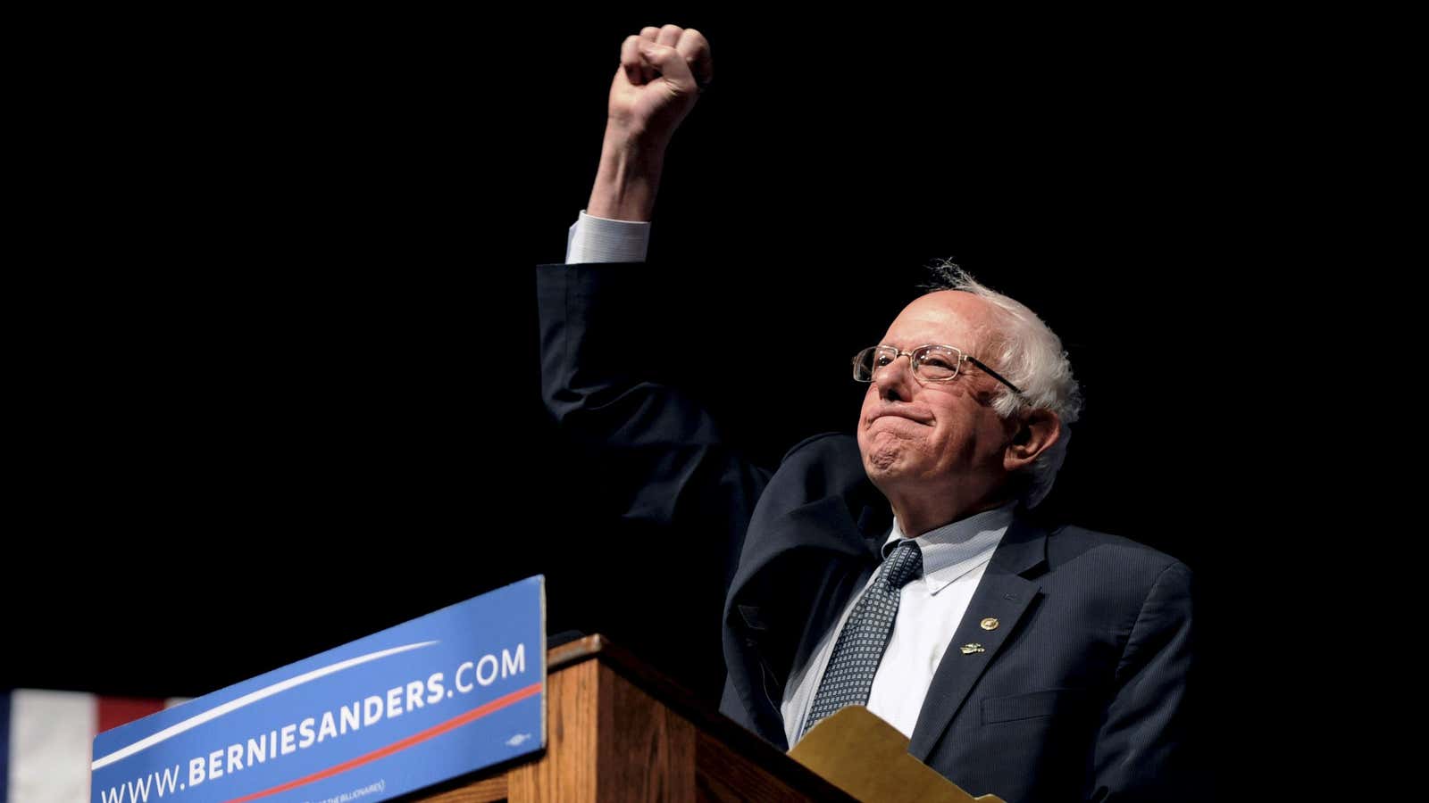 Democratic U.S. presidential candidate Bernie Sanders pumps his fist after announcing he won the Wisconsin primary at a campaign rally at the University of Wyoming  in Laramie, Wyoming April 5, 2016.