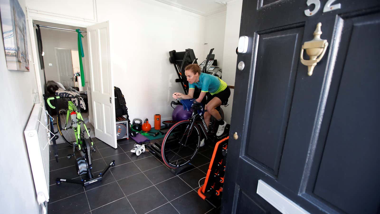 Team GB paratriathlete Claire Cashmore on a stationary bike during a training session following the outbreak of the coronavirus disease.