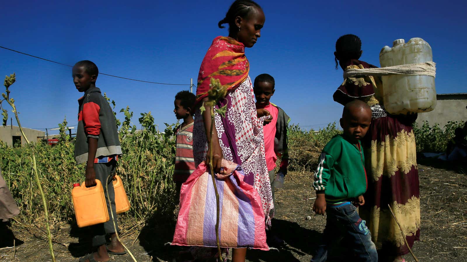 Ethiopian refugees fleeing from the ongoing fighting in Tigray region on the Sudan-Ethiopia border, in Kassala state, Sudan Nov. 24, 2020.