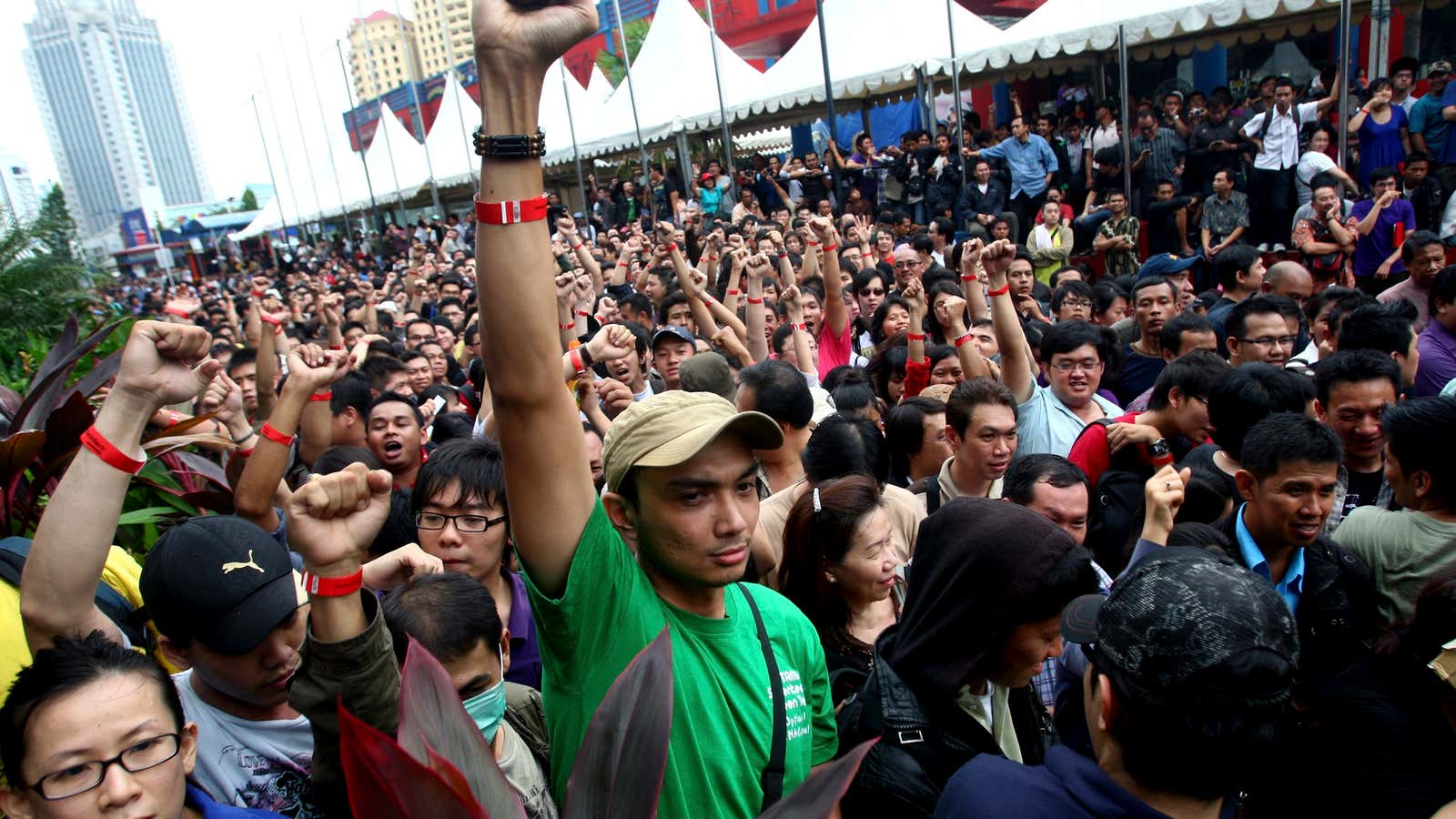 Indonesians queue for a BlackBerry launch in 2011. Such scenes may get rarer as the state curtails foreign retail.