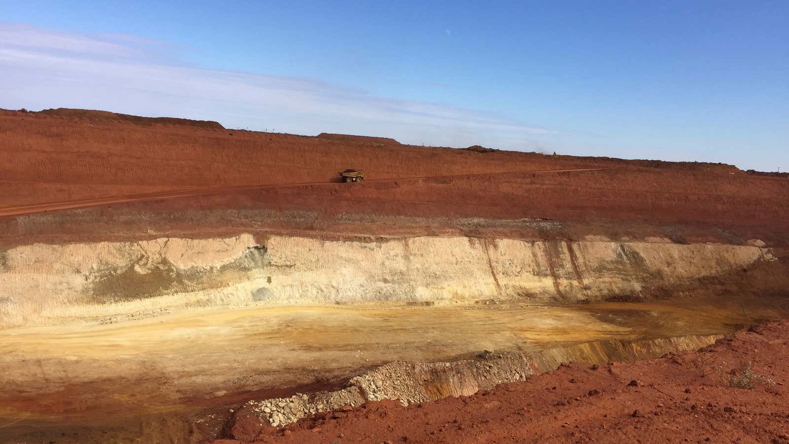 A truck carrying rare earth travels towards Lynas Corp’s Mount Weld processing plant, northeast of Perth, in Western Australia, August 23, 2019. Picture taken August…