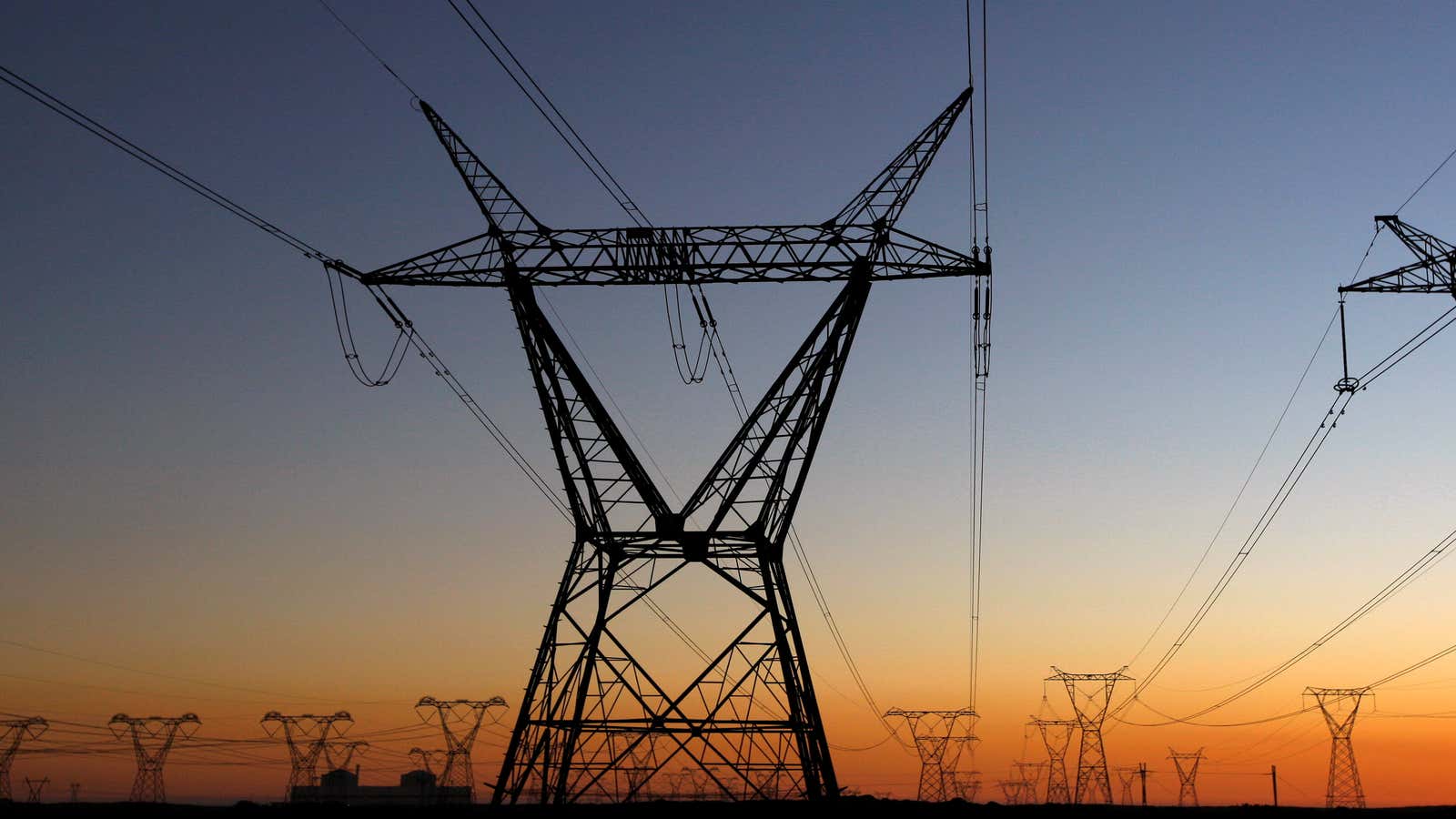 Electricity pylons carry power from Cape Town’s Koeberg nuclear power plant, South Africa