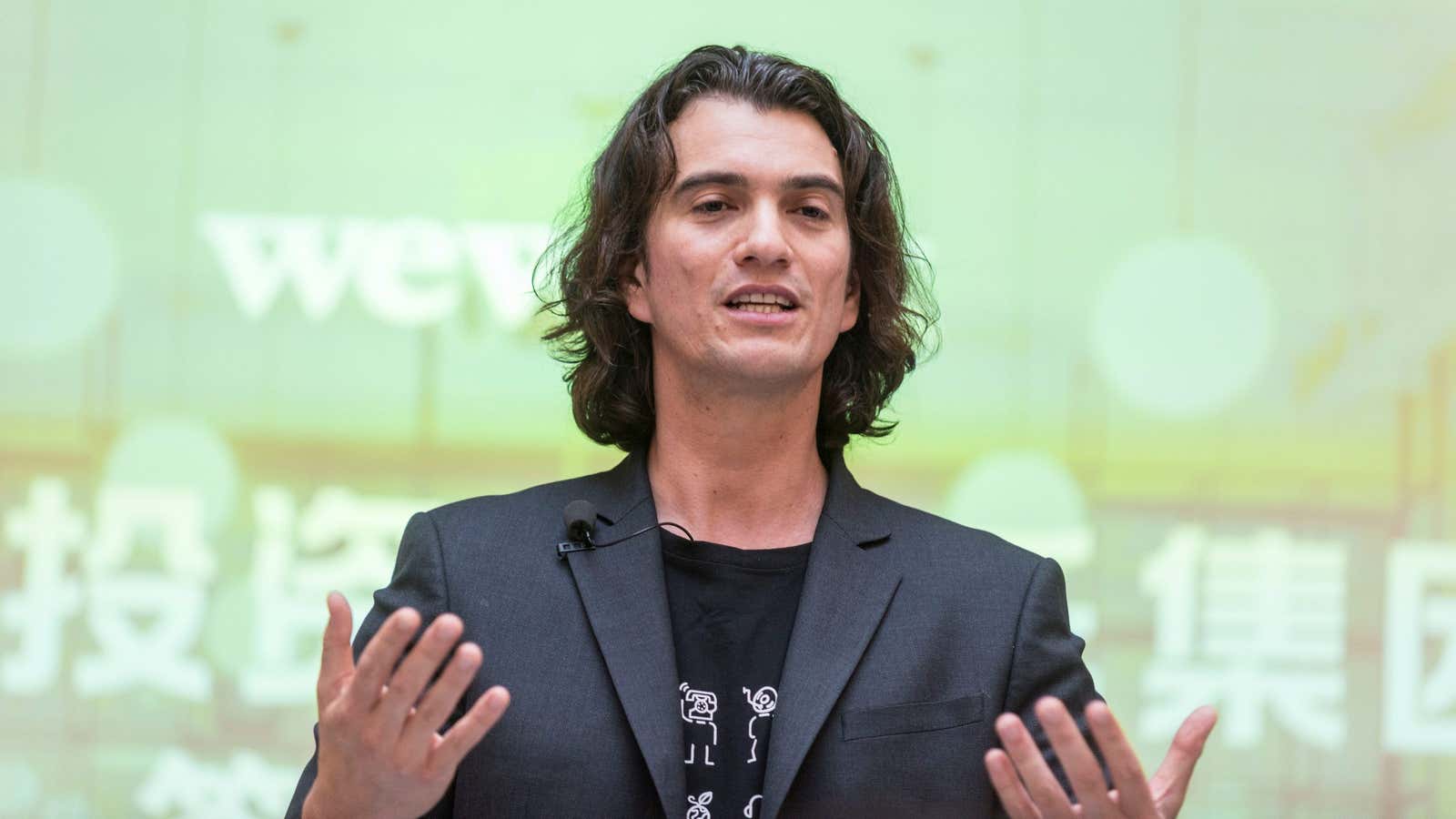 Adam Neumann, chief executive officer of U.S. co-working firm WeWork, speaks during a signing ceremony in Shanghai, China April 12, 2018. Picture taken April 12,…