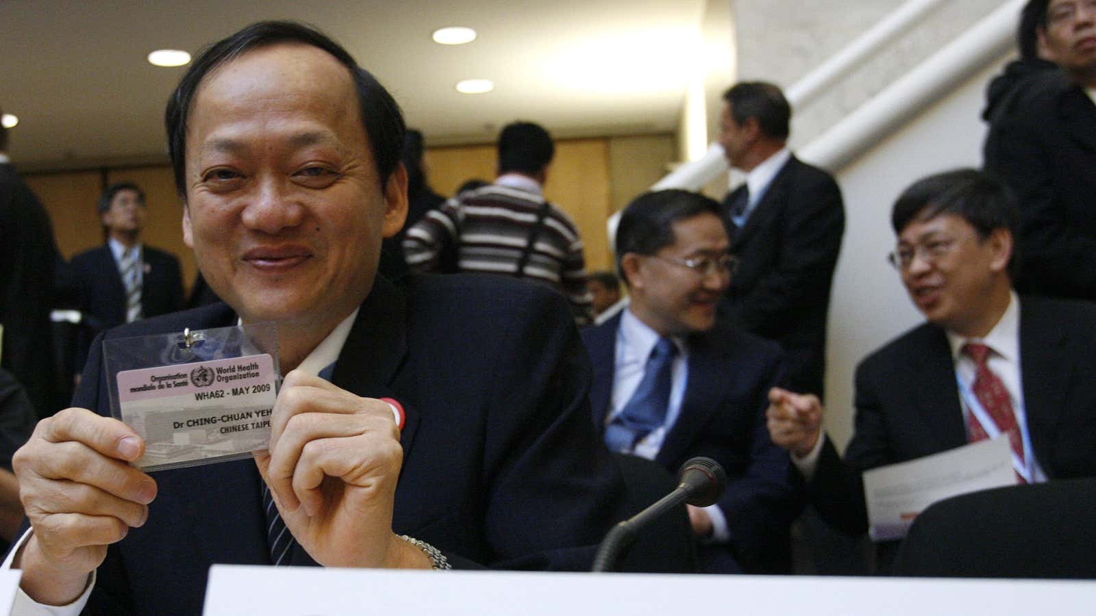Taiwan’s former health minister, Yeh Ching-chuan, displays his observer badge at the opening of the 62nd World Health Assembly in 2009—the first time Taiwan was granted observer status by the WHO.