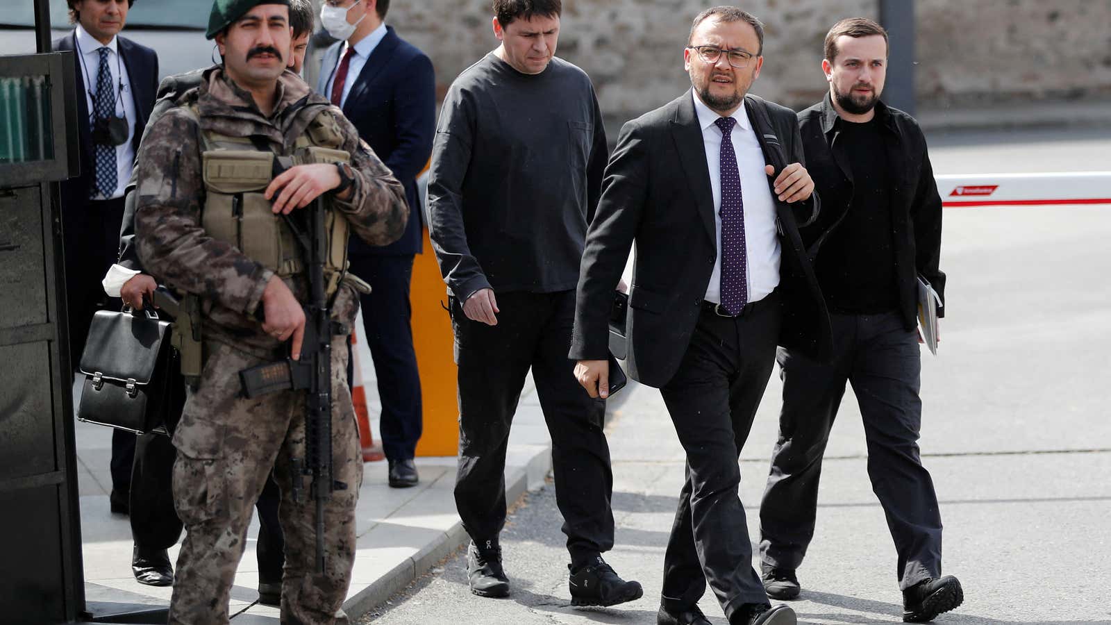 Mykhailo Podolyak, a political adviser to Ukrainian President Volodymyr Zelenskiy, and Ukrainian Ambassador to Turkey Vasyl Bodnar walk after their meeting with Russian negotiators in Istanbul.