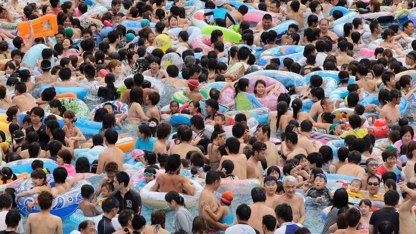 People pack a pool in Tokyo, Japan during a deadly heatwave in August, 2013.