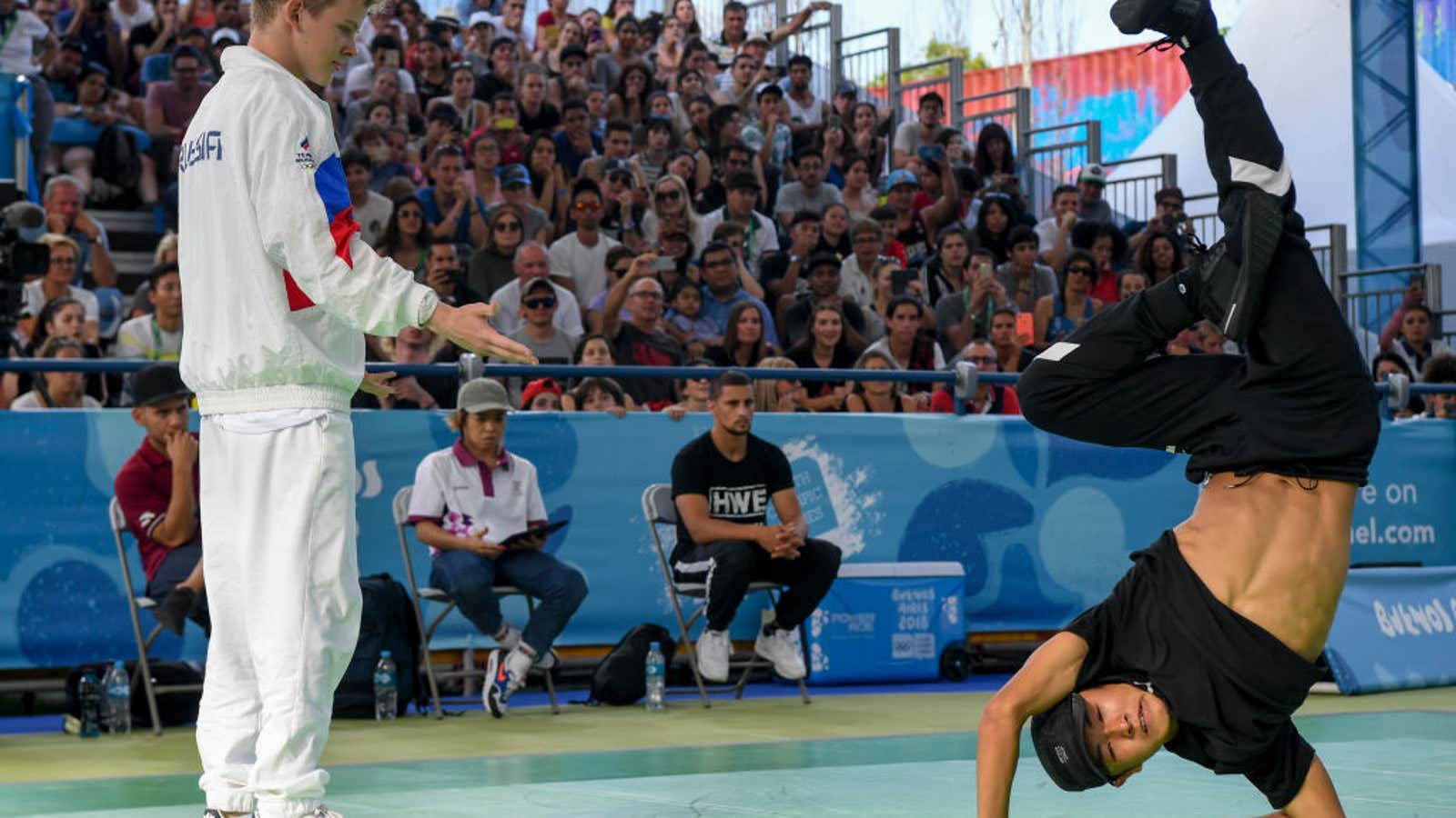 Japan’s b-boy Shigelix (R) competes against Russia’s b-boy Bumblebee during a battle at the Youth Olympic Games in Buenos Aires, Argentina on October 08, 2018.