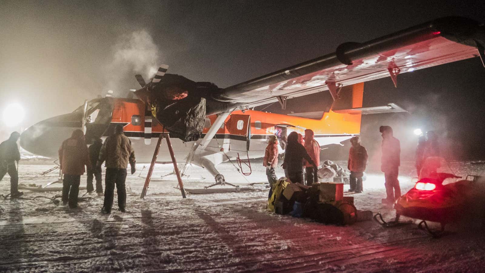 A Twin Otter plane picks up two sick workers at the US South Pole science station. Once the patients and the crew rest, they will then fly off Antarctica for medical attention that could not be provided on the remote continent. (National Science Foundation via AP/Robert Schwarz)