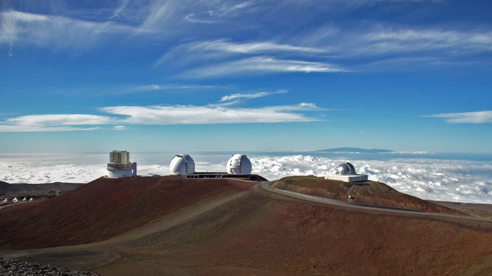 A pair of preexisting telescopes atop Mauna Kea.