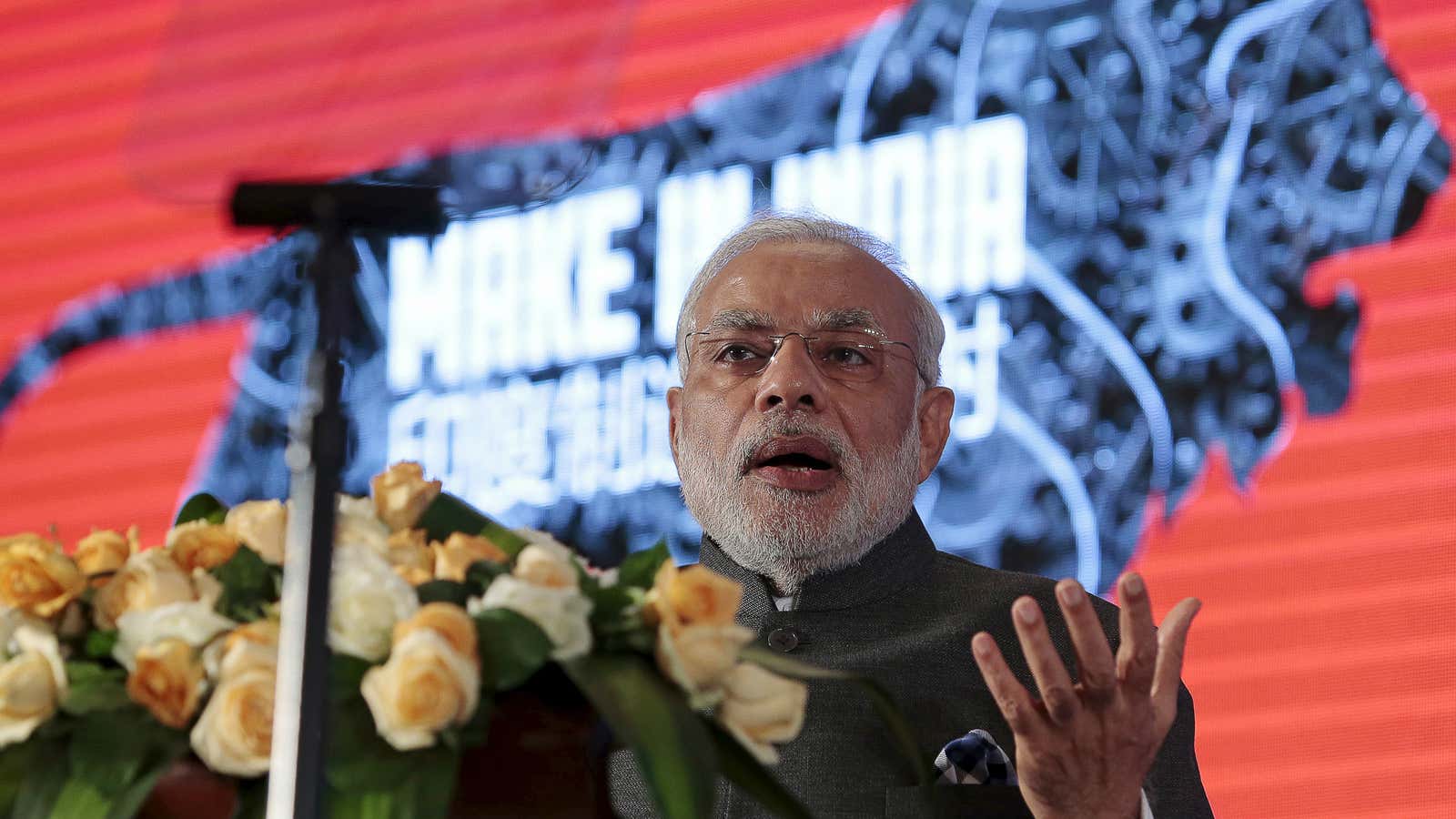 Modi speaks in Shanghai on May 16.