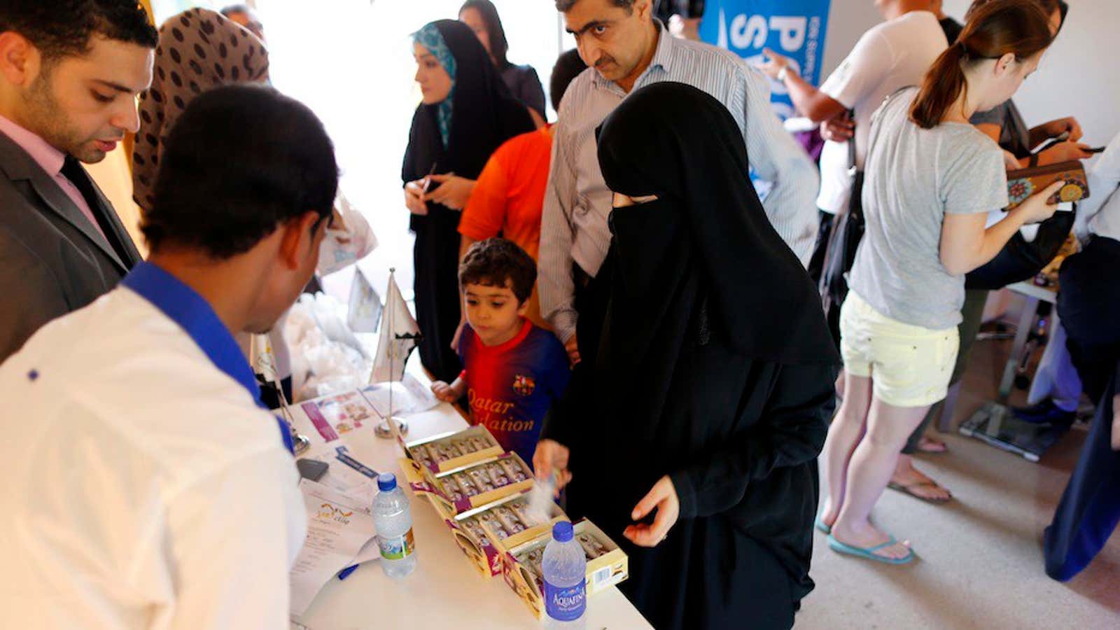 People register for the “Your Weight in Gold” contest in Dubai in September.