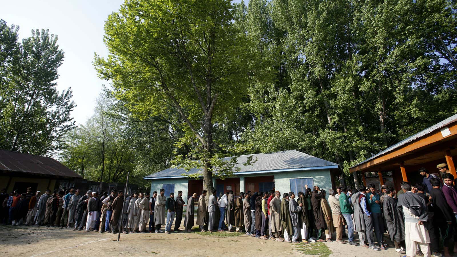 Voters line up in Kashmir.