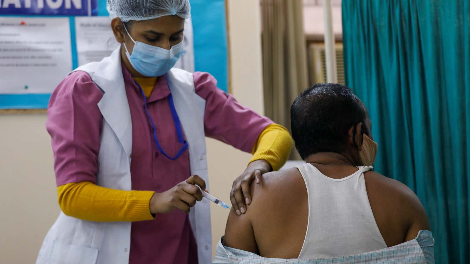 A man receives Bharat Biotech’s Covaxin vaccine.