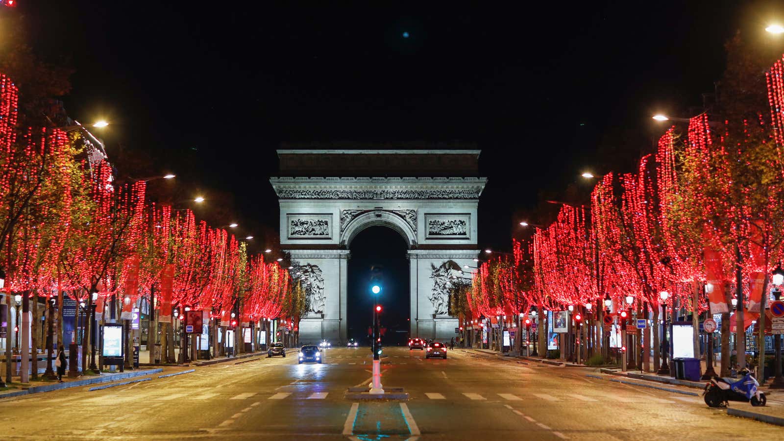 A view shows the deserted Champs Elysees avenue leading up to the Arc de Triomphe in Paris during a nationwide curfew, from 8 p.m. to 6 a.m., due to restrictions against the spread of the coronavirus disease (COVID-19) in France, December 15, 2020. REUTERS/Gonzalo Fuentes