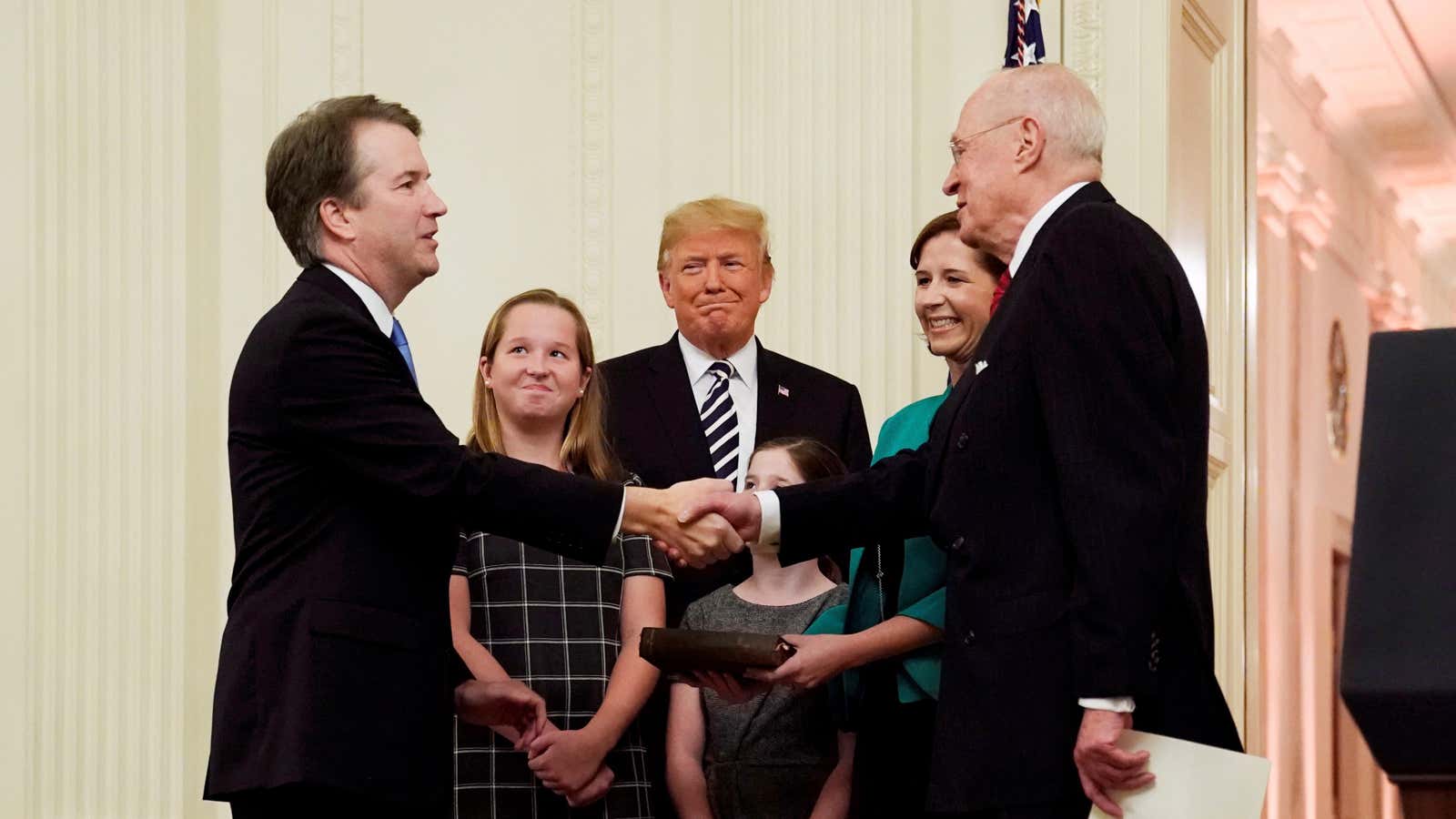 Brett Kavanaugh is congratulated by  Anthony Kennedy at his swearing-in ceremony last year.