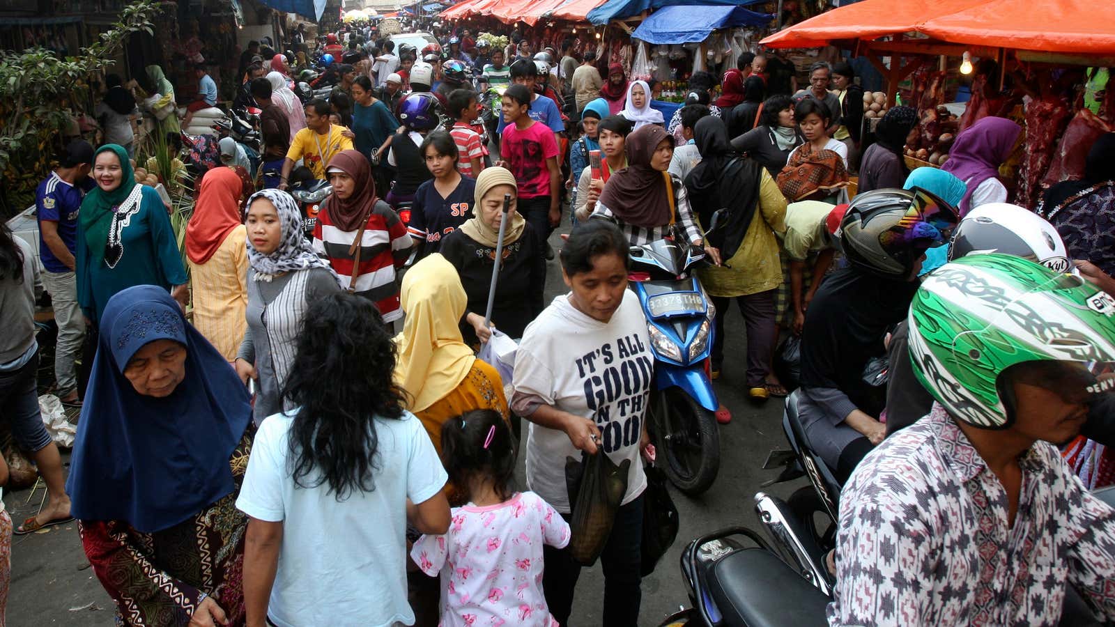 Shoppers in Indonesia, which offers foreign businesses tempting opportunities and scary political risks.