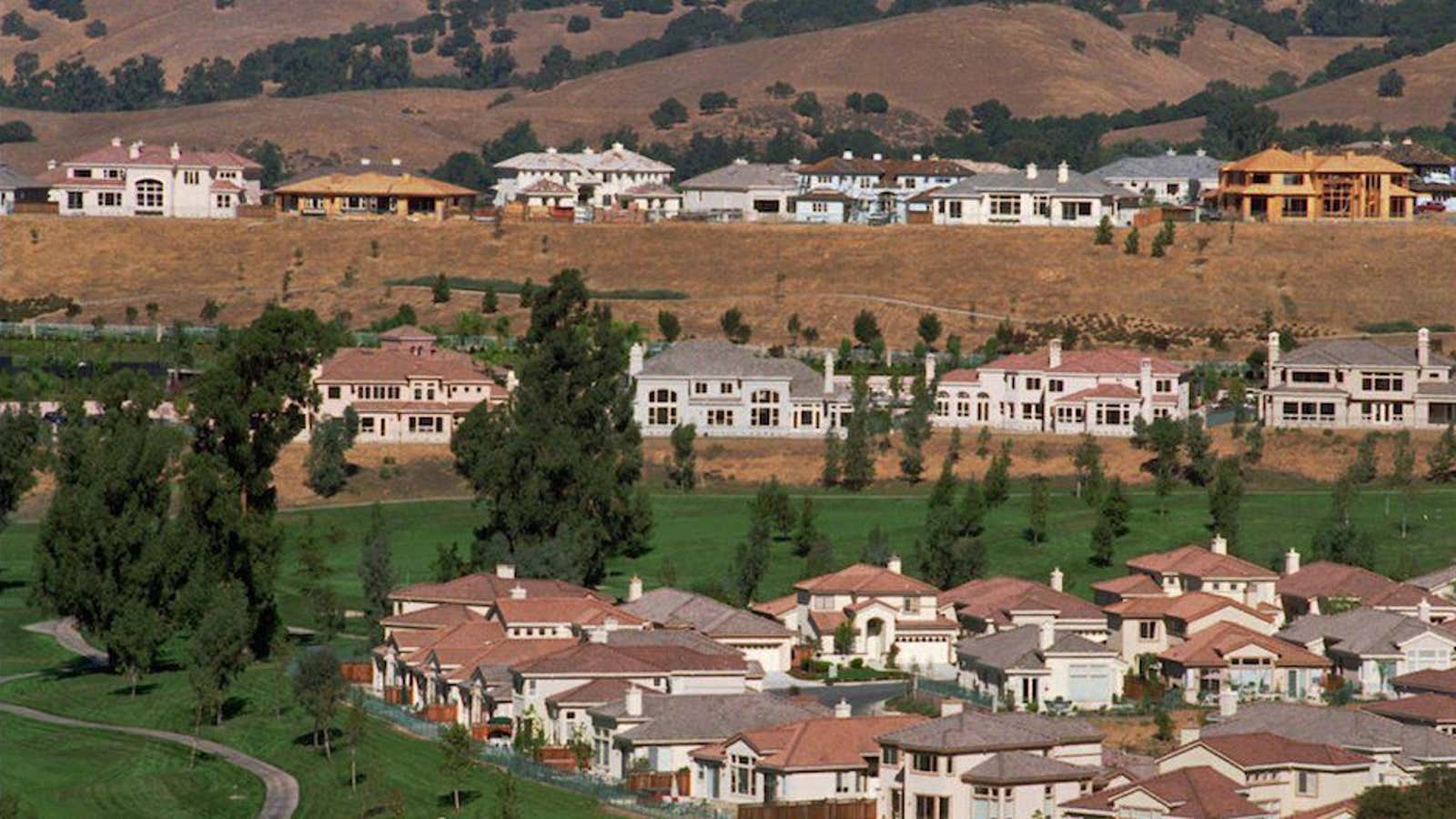 Homes under construction on a hillside above Silver Creek Valley Country Club in San Jose, Calif.