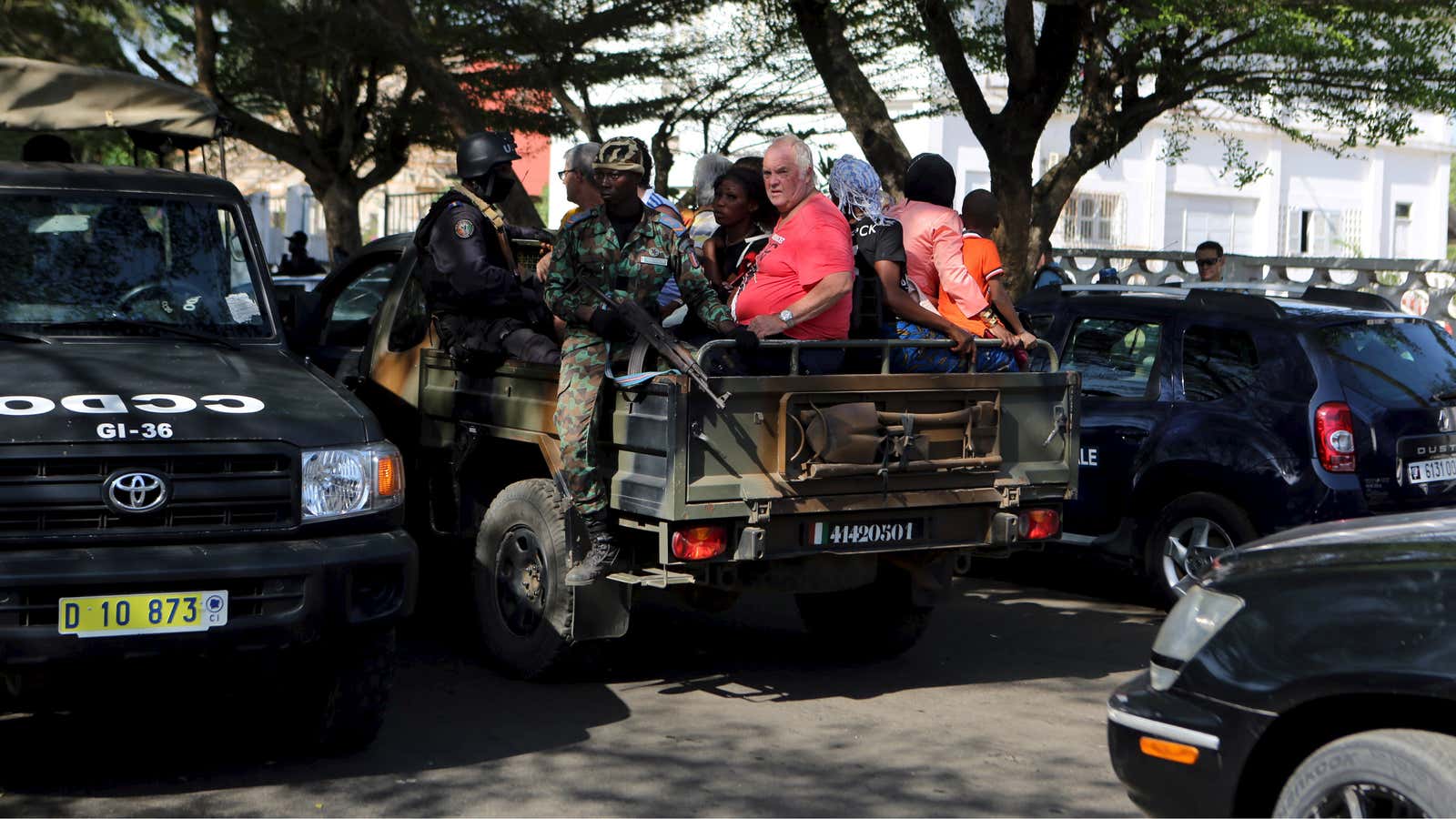 Military officials at the scene of the attack.