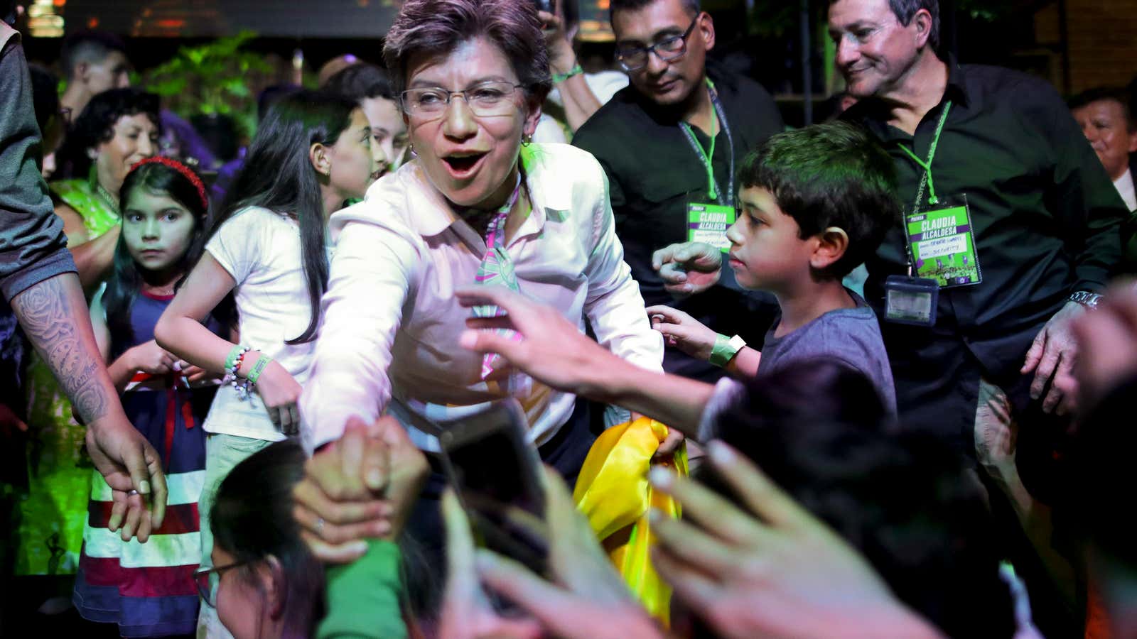 Claudia Lopez celebrates her victory on Sunday, Oct 27.