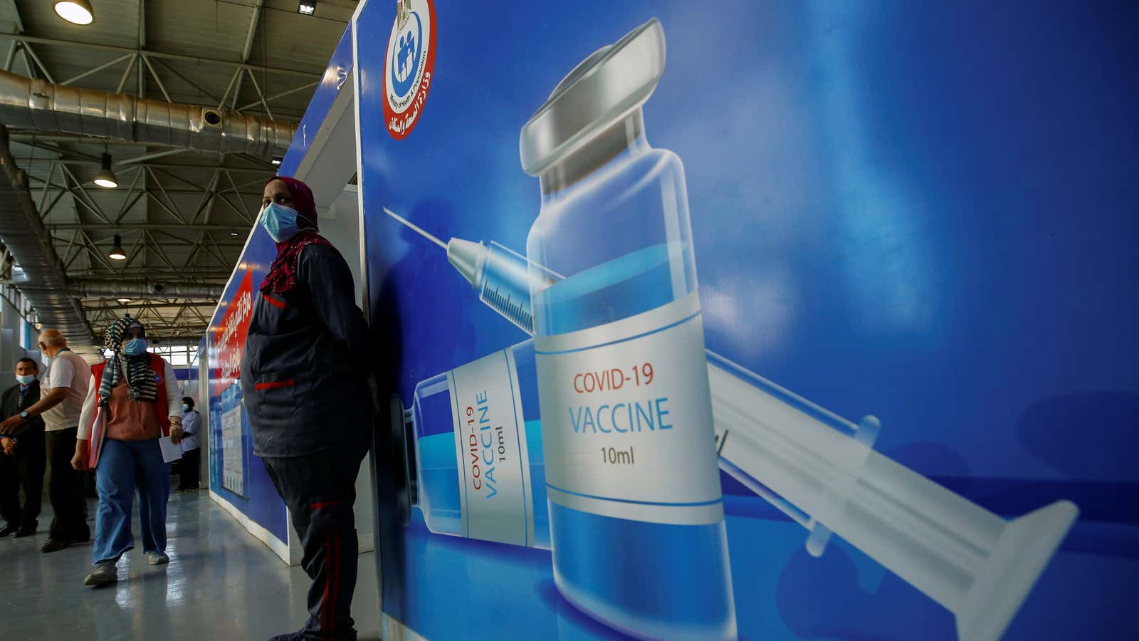 People wait to receive the Covid-19 vaccine at a mass immunization venue in Cairo on June 2. Egypt is joining the race to produce critically-needed Covid-19 vaccines for Africa.