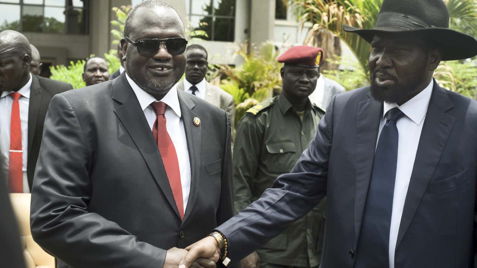 South Sudan’s vice president Riek Machar, left, and president Salva Kiir shake hands.