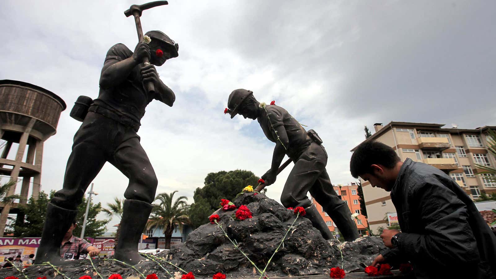 Mourning at a miner’s monument in Turkey.