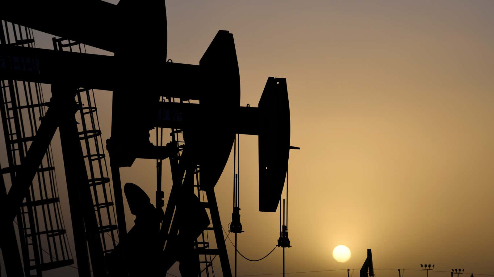 Pump jacks operate at sunset in Midland, Texas, U.S., February 11, 2019.