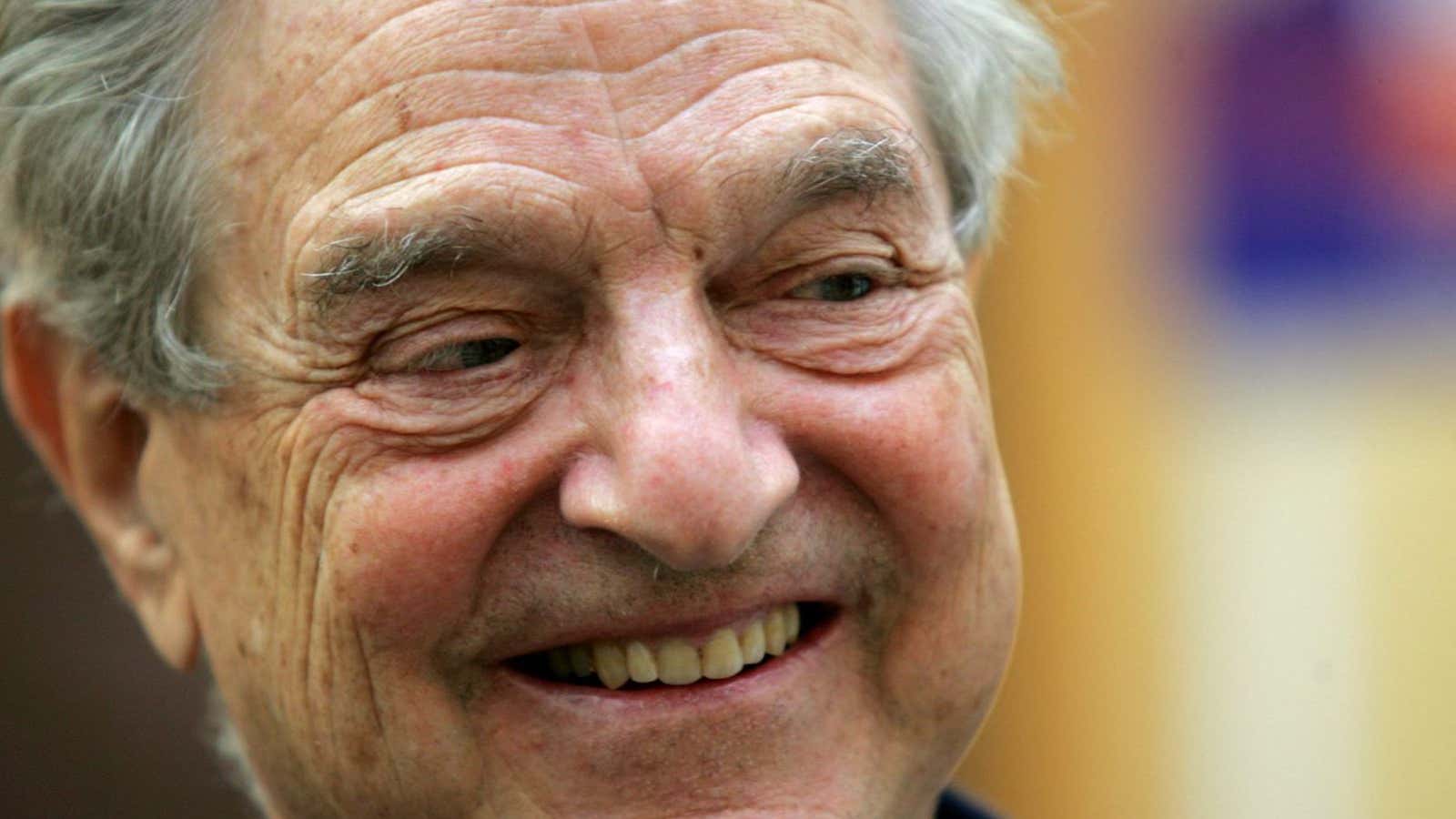 Soros is all smiles.