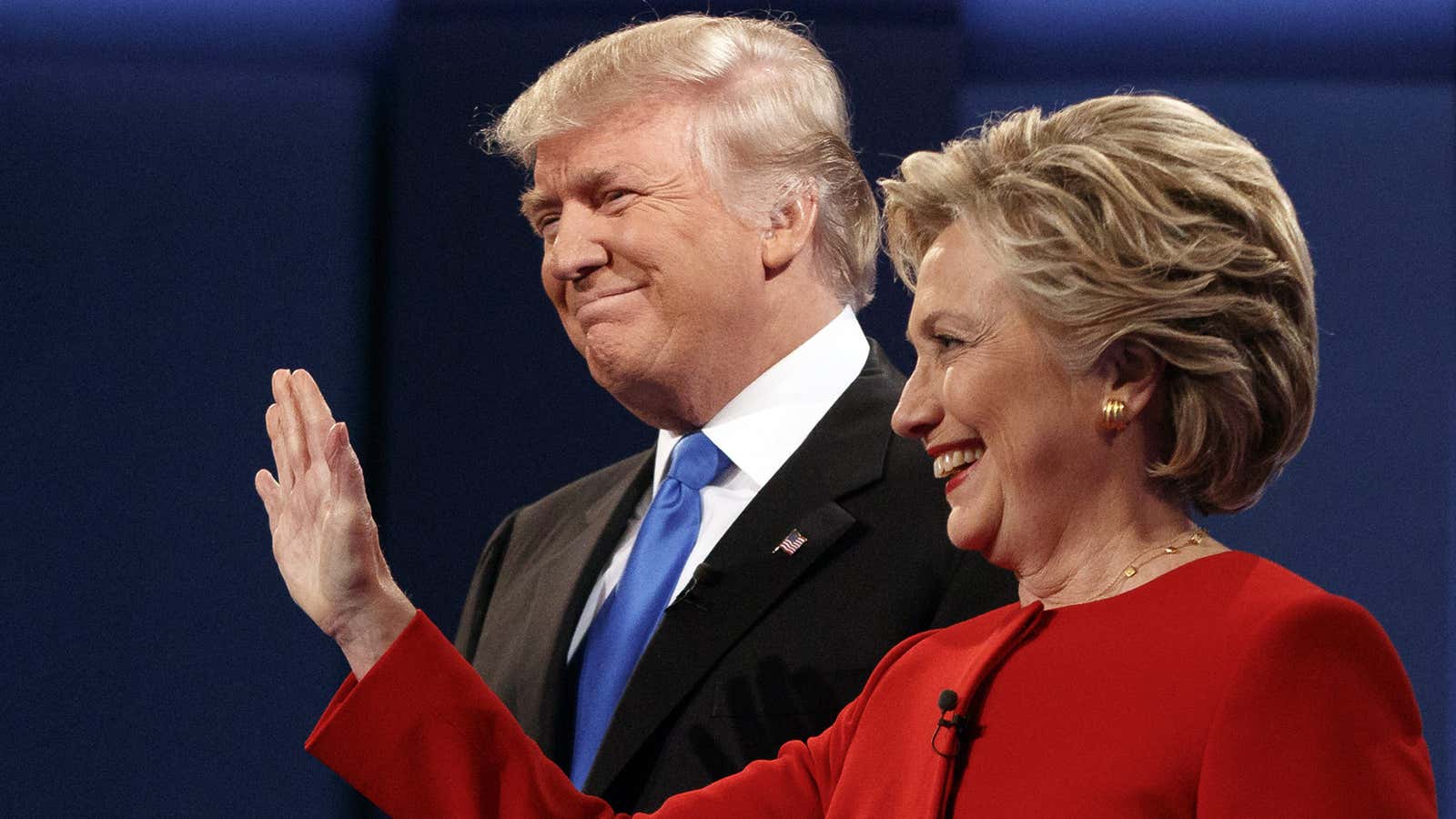 Republican presidential candidate Donald Trump, left, stands with Democratic presidential candidate Hillary Clinton at the first presidential debate at Hofstra University, Monday, Sept. 26, 2016,…