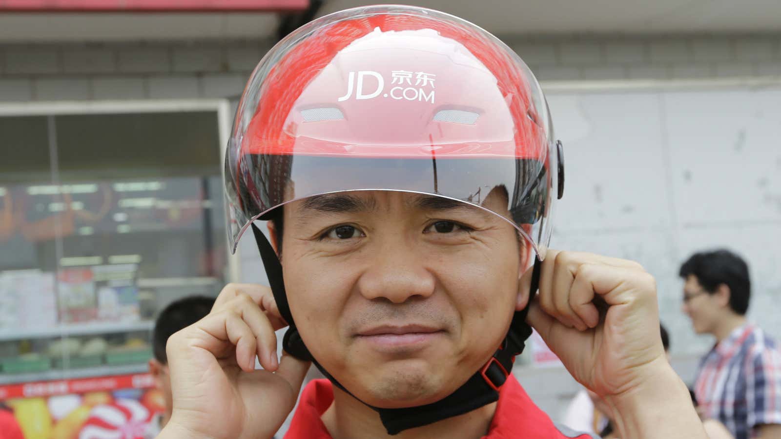 JD.com CEO Liu Qiangdong dons a company helmet.