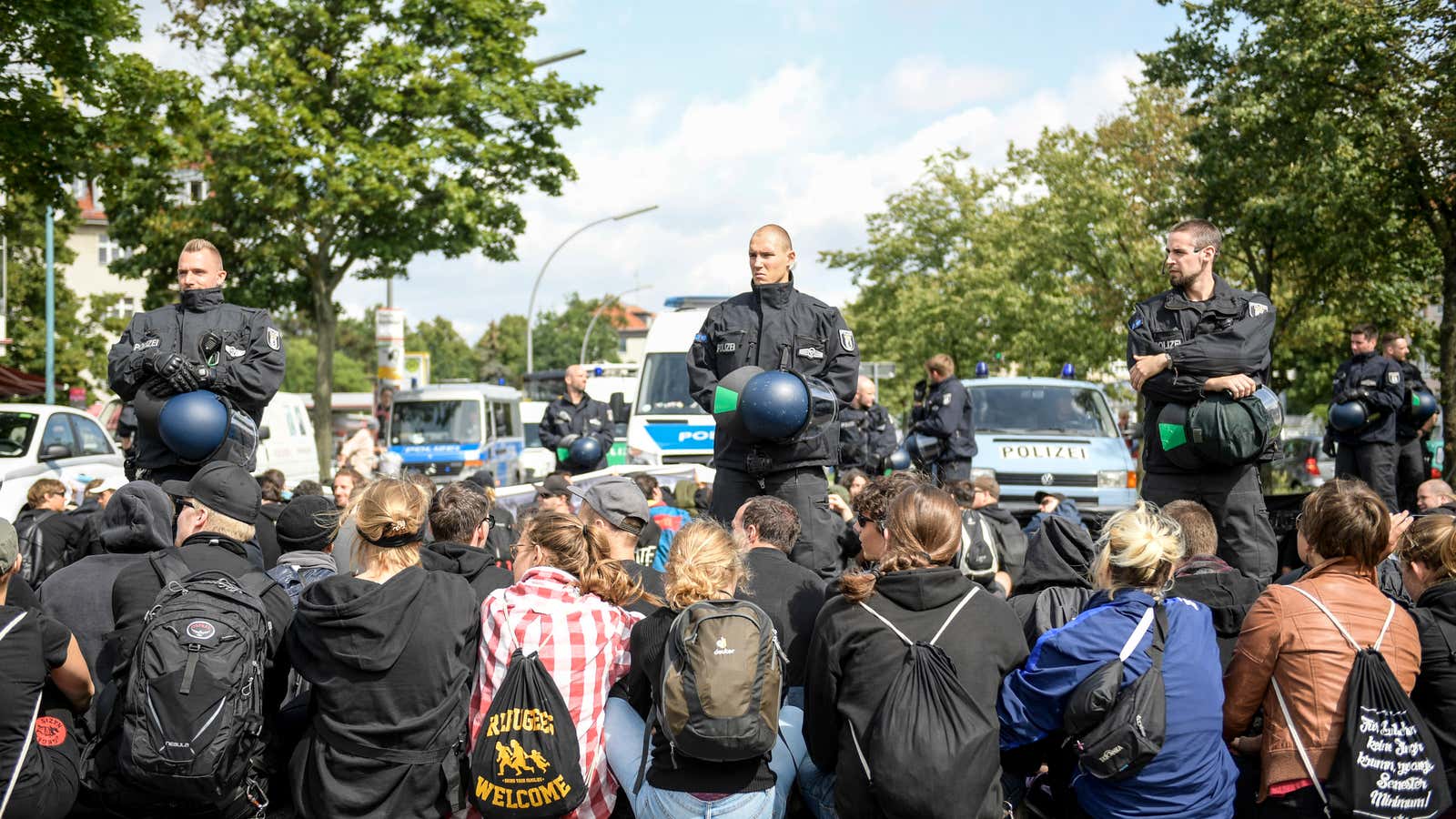 Anti-fascist demonstrators block the neo-Nazi march route