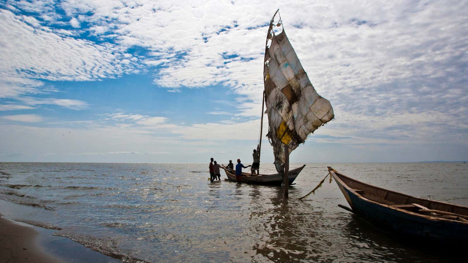 Turkana men sail their fishing boats near the shores of Lake Turkana, northeast of Kenya’s capital Nairobi