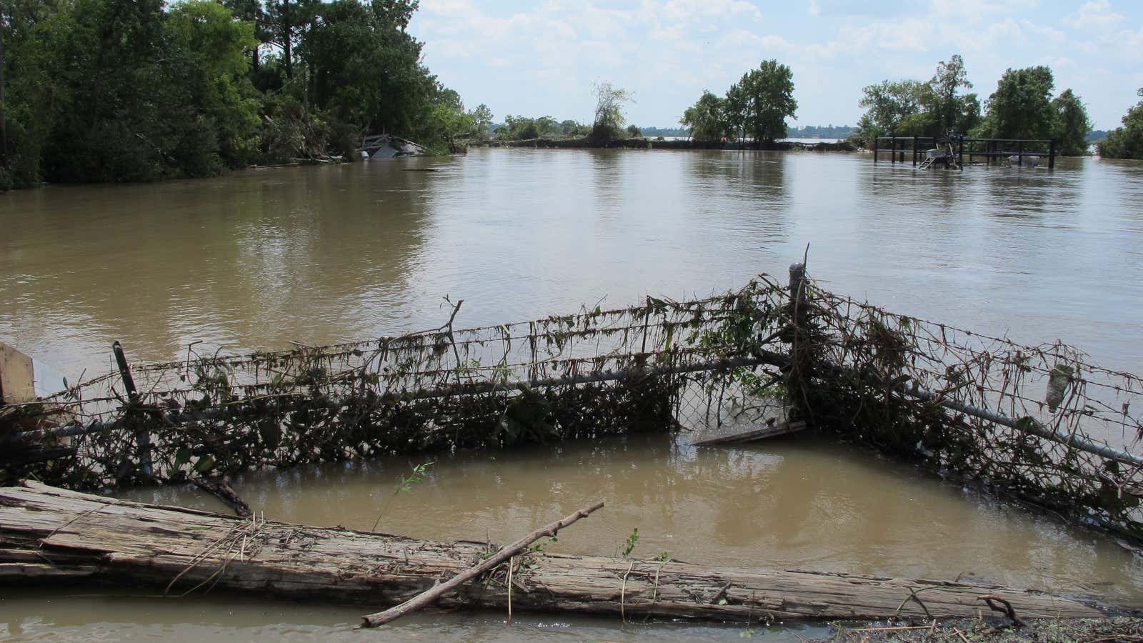 Superfund sites like the Highlands Acid Pit in Texas, shown here flooded by Hurricane Harvey in 2017, are at dire risk from climate change.