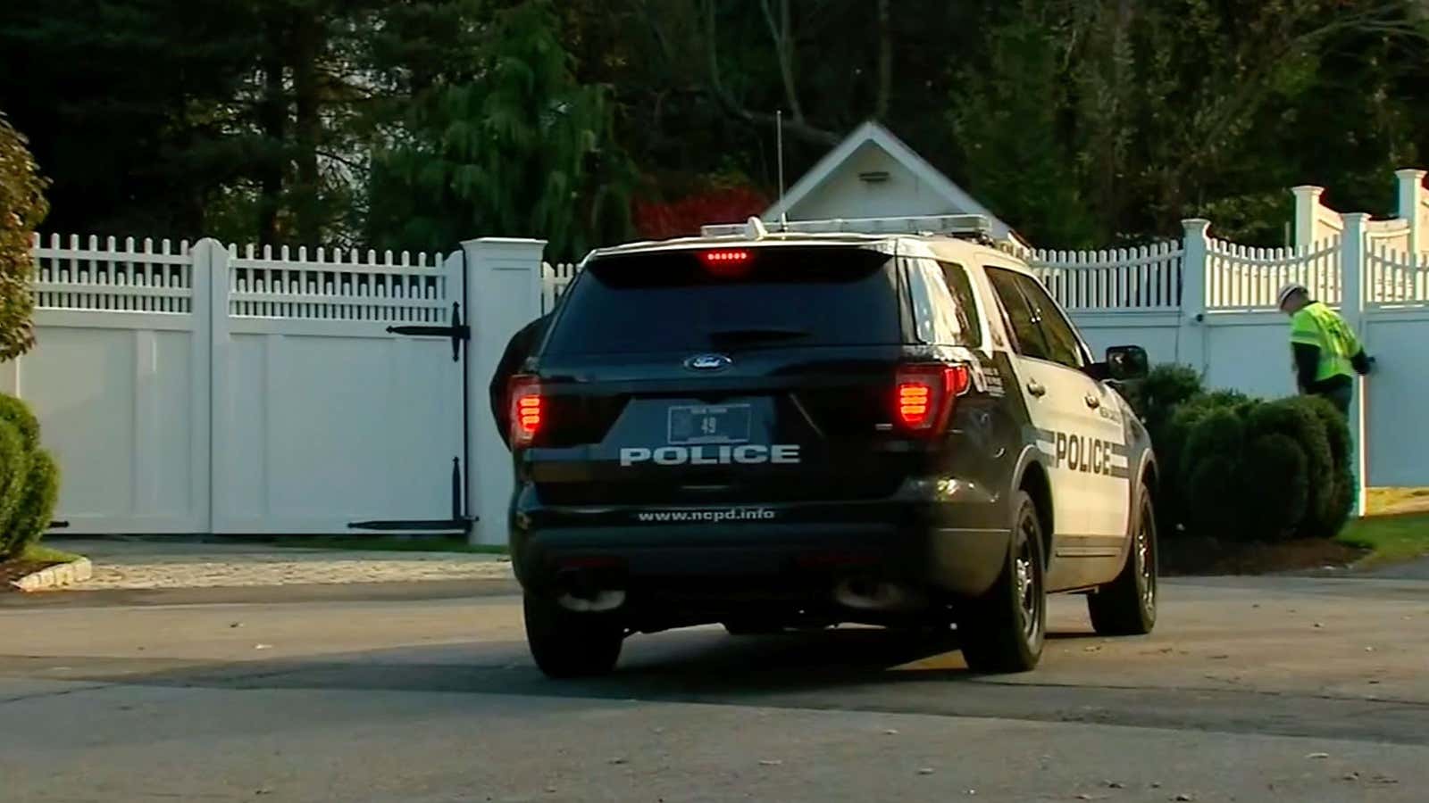 Police outside the Clinton home.