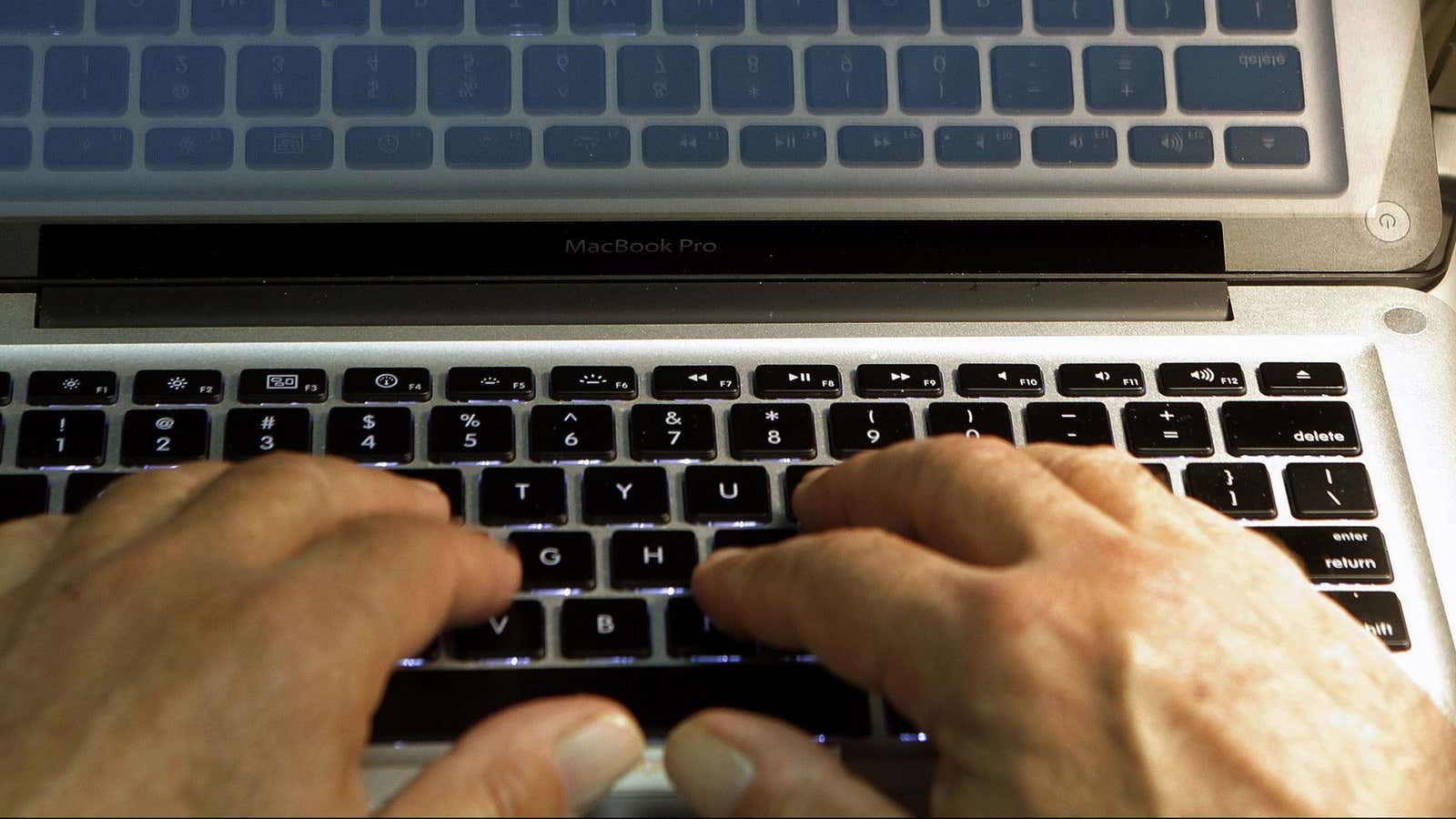 FILE – In this Feb. 27, 2013, file photo illustration, hands type on a computer keyboard in Los Angeles. As tax day nears, phishing season…