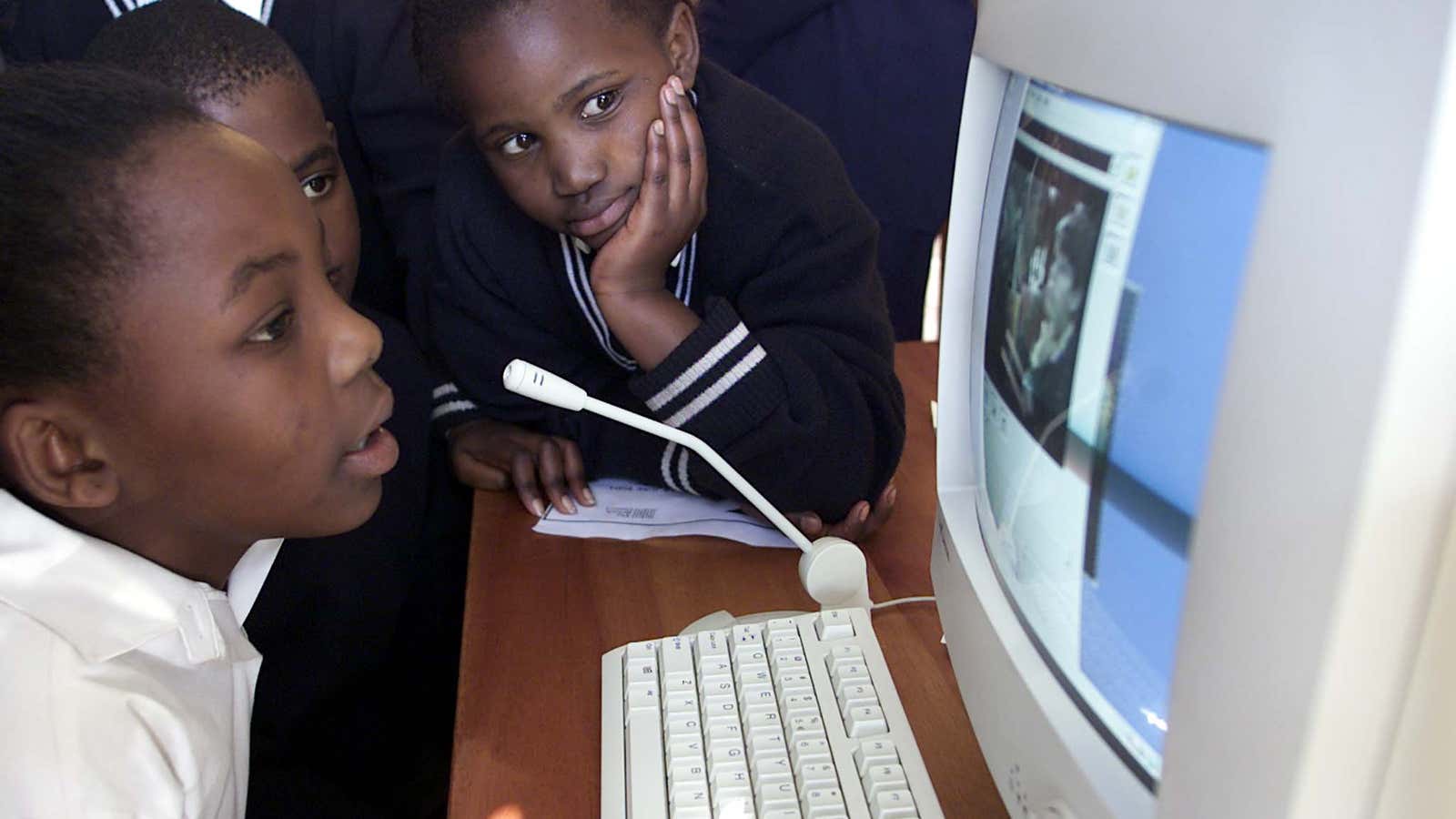 Nomthandazo Sithole leads a classroom internet chat with students in Scotland at Khutala Primary School in Soweto.
